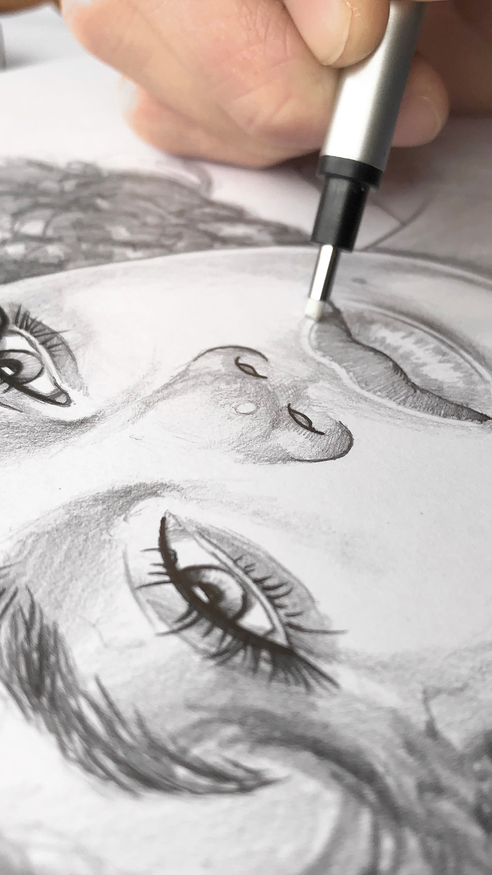 Michigan State Police sketch artist Detective Trooper Sarah Krebs draws  specific eye details of a 